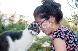 stock-photo-43534028-young-female-holding-her-loving-cat